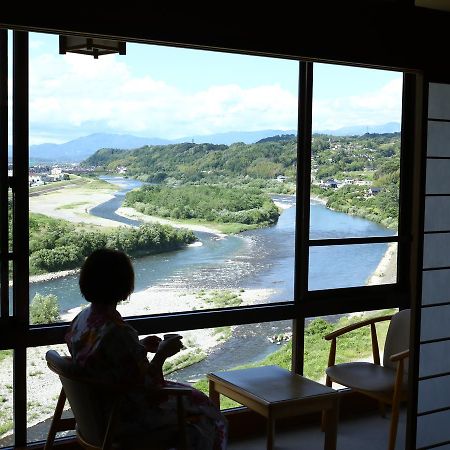 Yoshinotei Hotel Iida Buitenkant foto