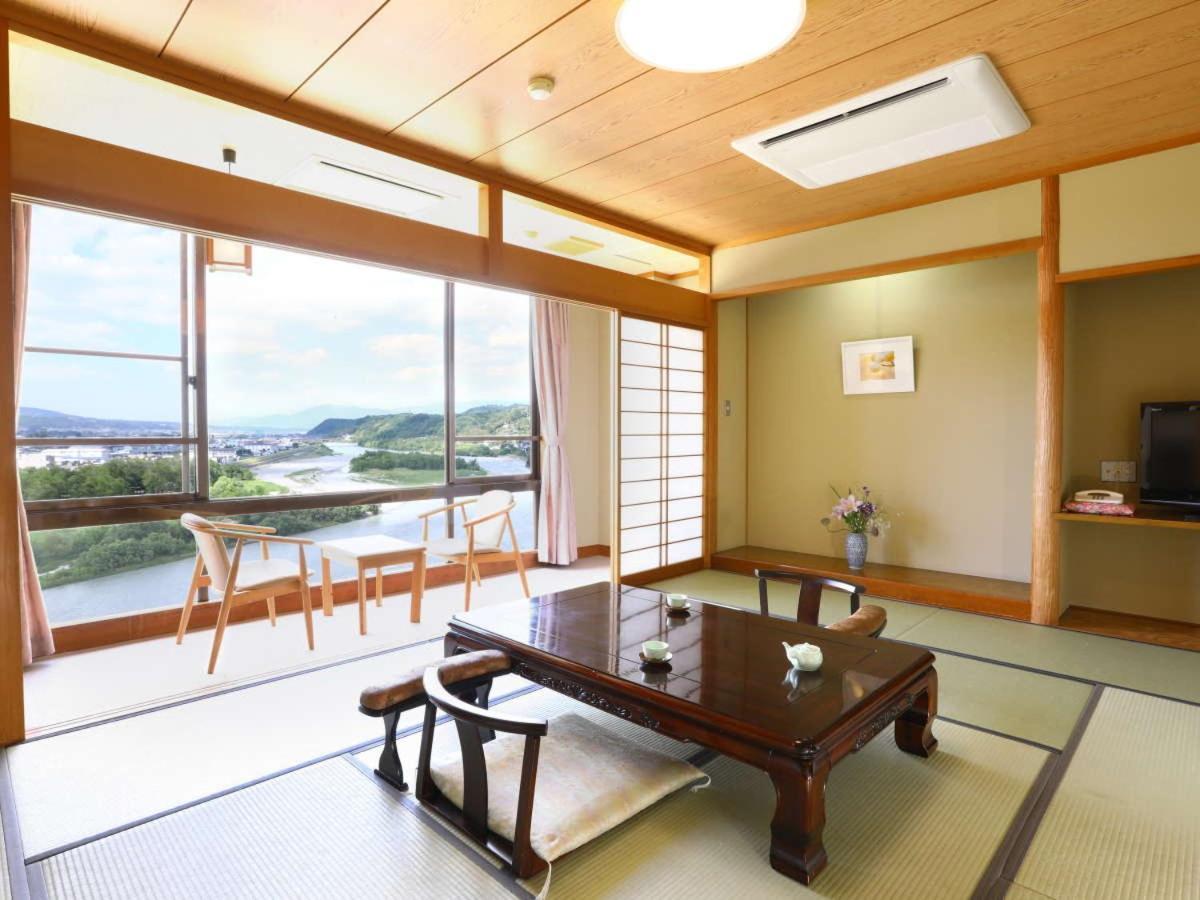 Yoshinotei Hotel Iida Buitenkant foto